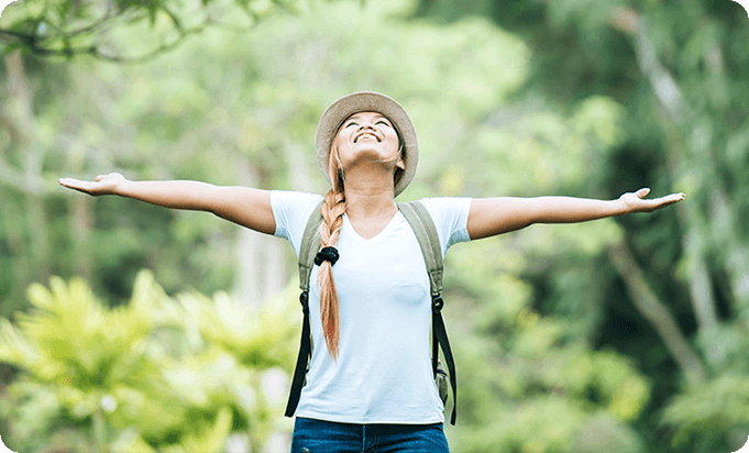 a photo of a happy woman looking up